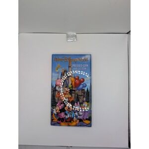 Disney Pressed Penny Album 44 Coin Collection Walt Disney World & Universal